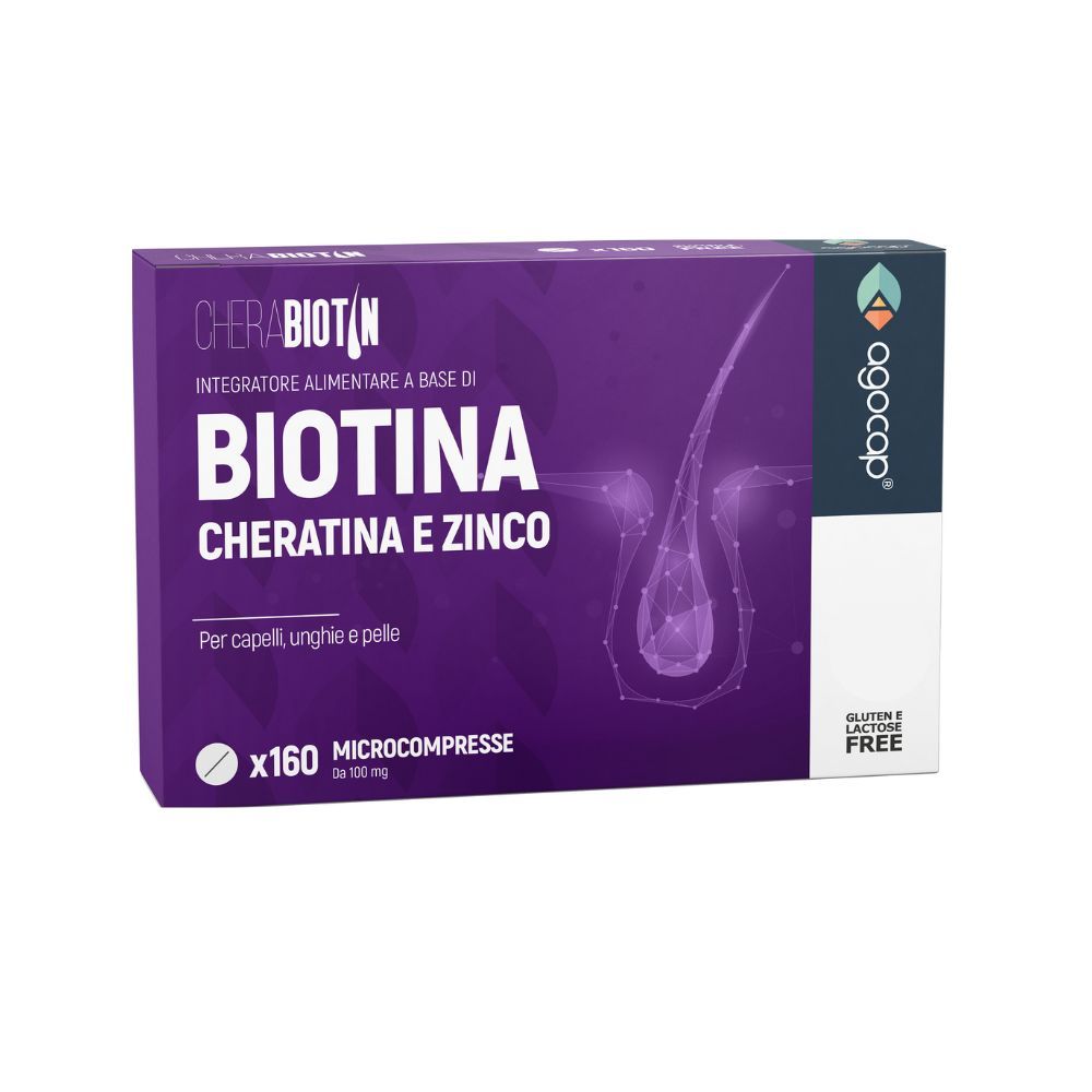Scatola viola "CheraBIOTIN". Contiene 160 microcompresse con biotina, cheratina e zinco. Senza glutine.