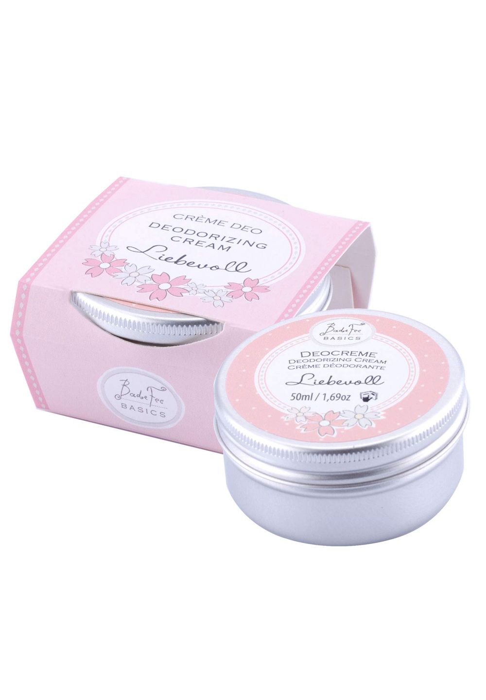 Zwei silberfarbene Deocreme-Tiegel mit rosa Etiketten und rosa Verpackung. Aufschrift: "Liebevoll" und "Deocreme".