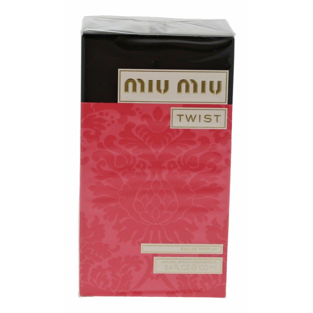 Verpackung. Rechteckige Schachtel mit rotem Muster und Logo. Schwarzer Deckel. Text: Eau de Parfum.