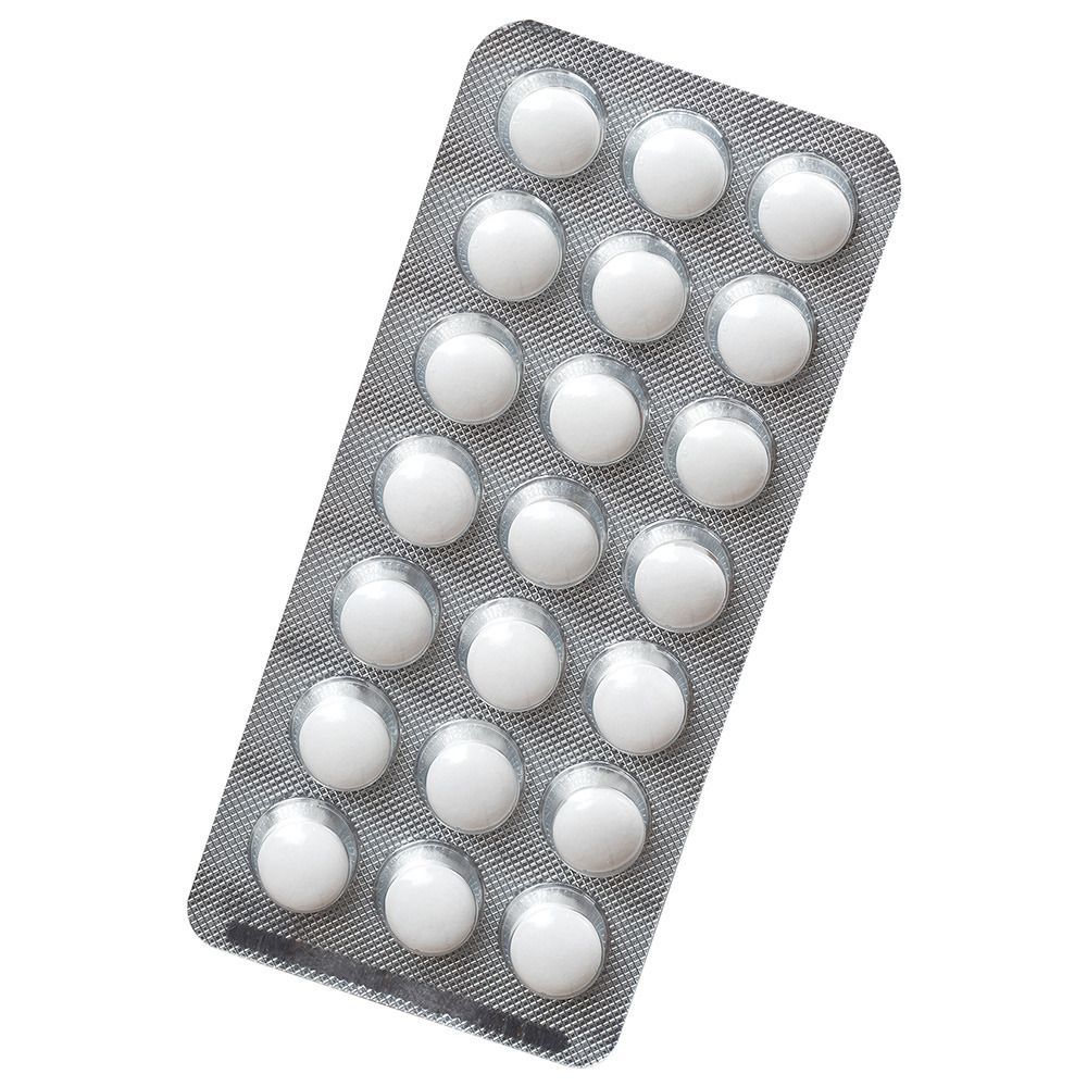 Blisterpackung mit weißen Tabletten. Tabletten in ovalen Vertiefungen, angeordnet in Reihen.