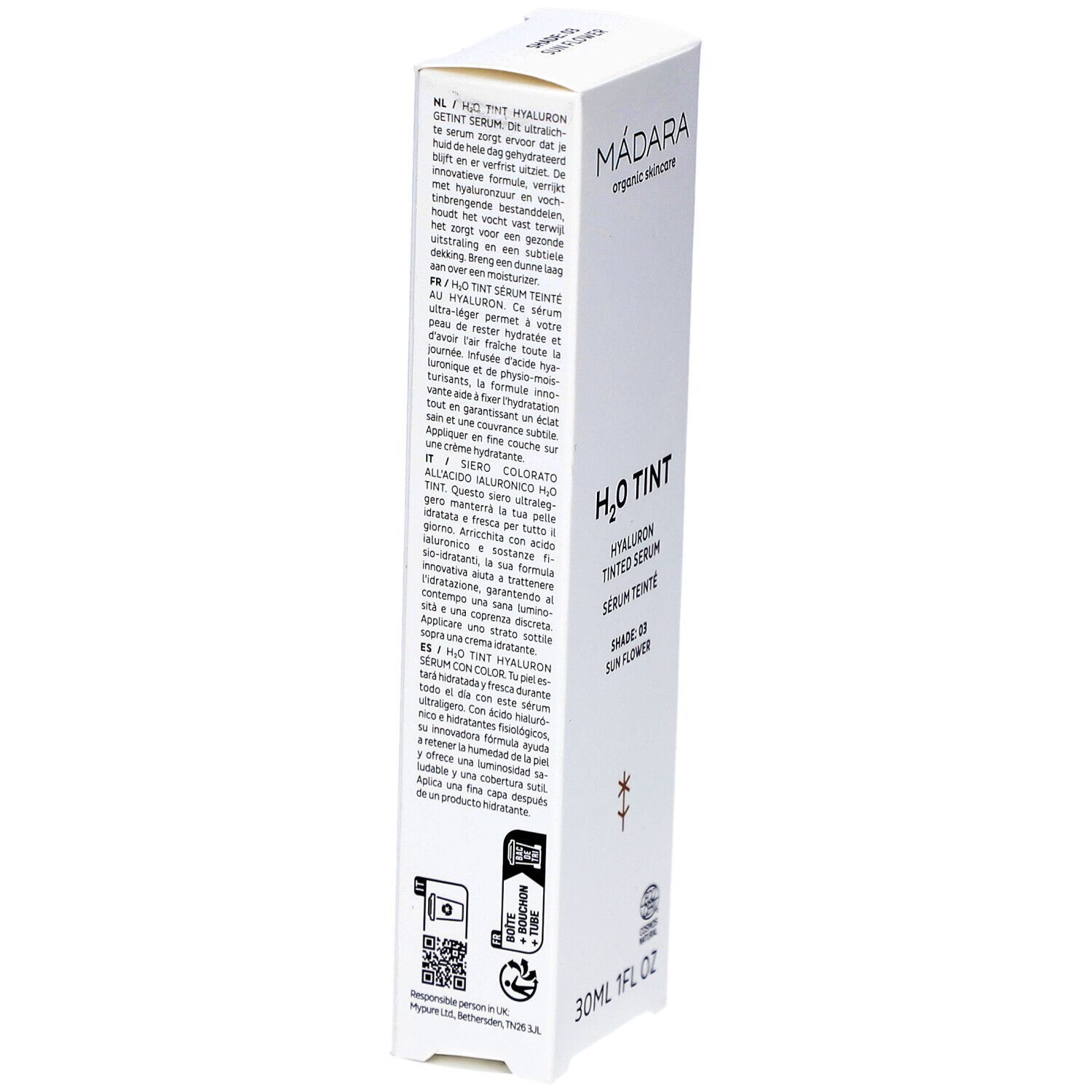 Weiße Verpackung mit Text. Rückseite mit Produktinformationen in verschiedenen Sprachen. Unten: 30ml 1FL OZ. Mit Zertifizierungen.