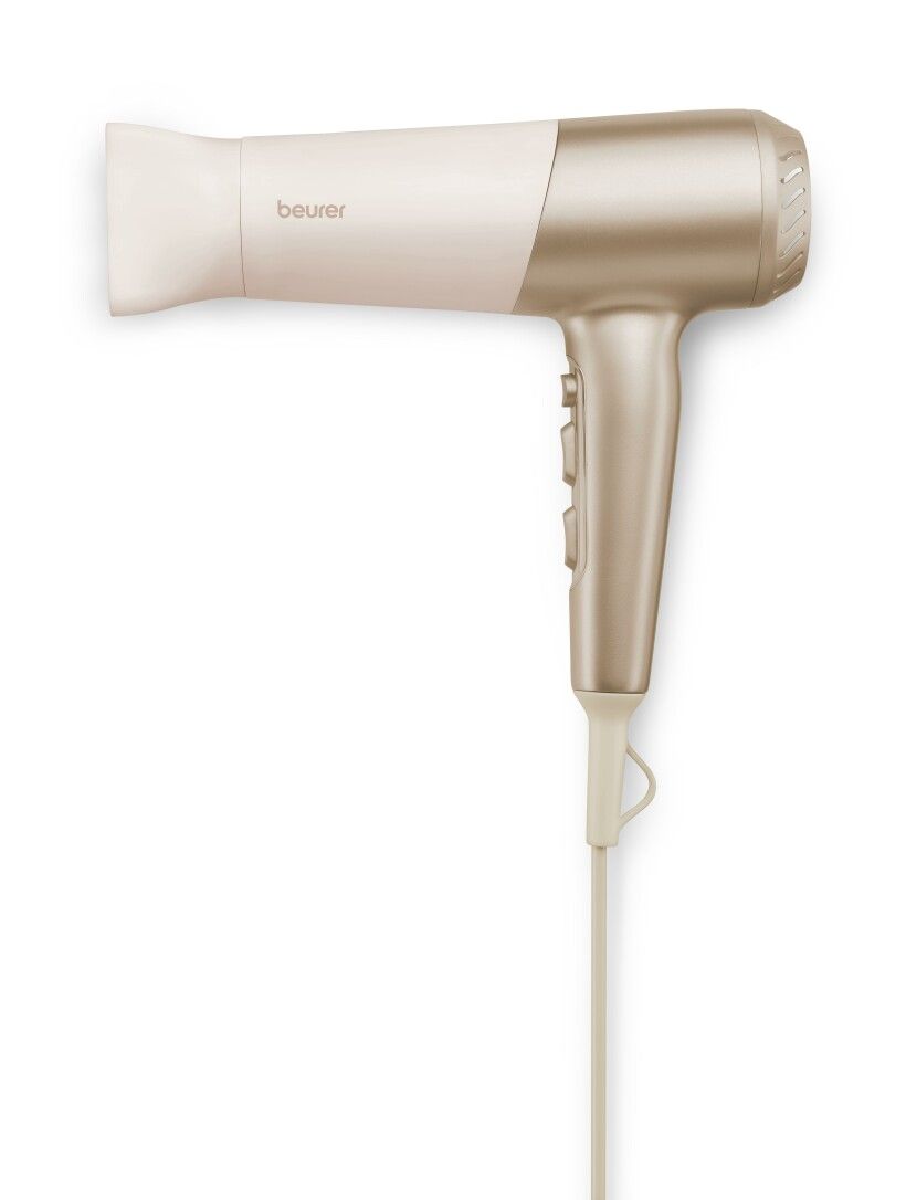 Haartrockner in Creme und Gold. Marke Beurer sichtbar.