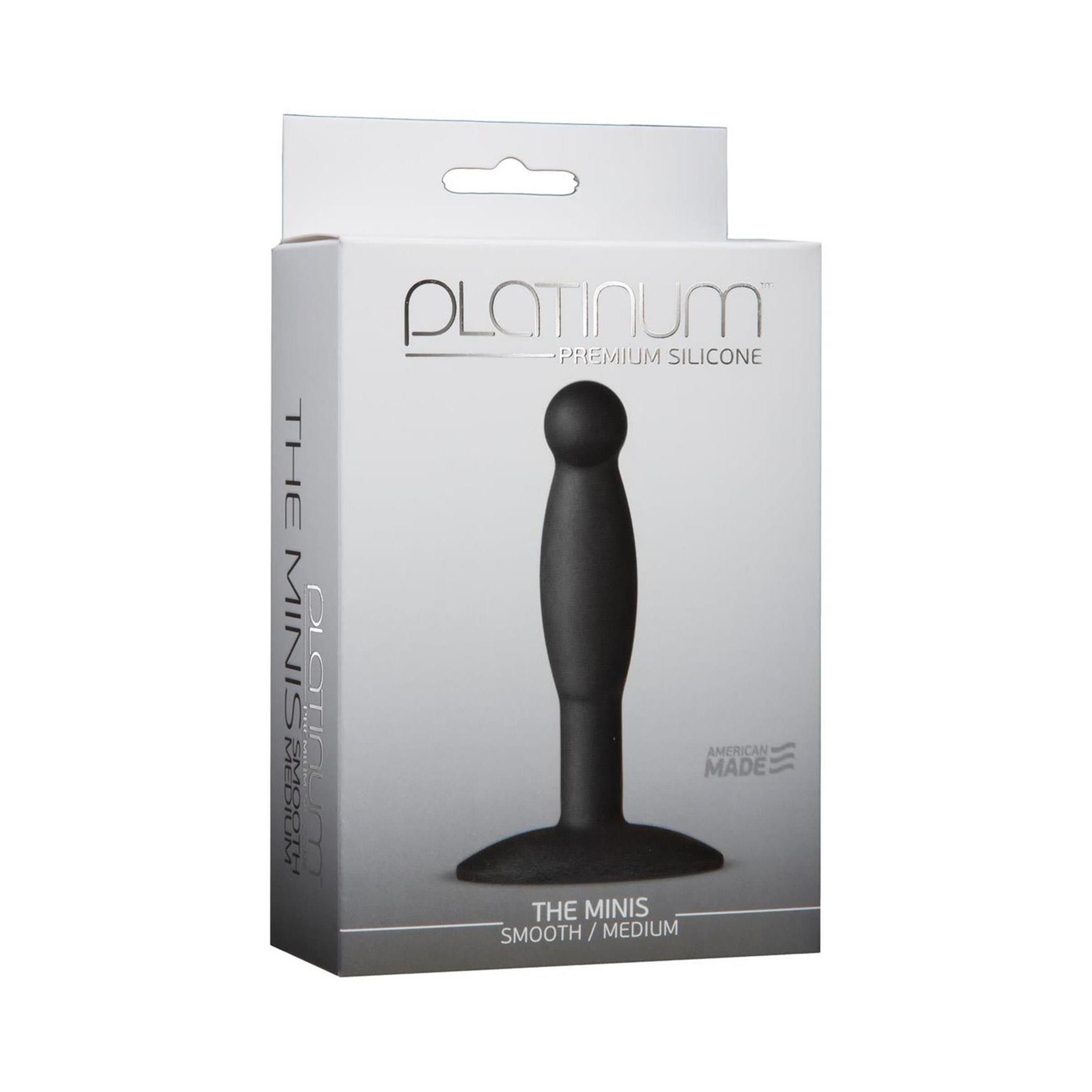 Schwarzer Butt Plug in Verpackung. Aufschrift: "PLATINUM PREMIUM SILICONE" und "THE MINIS SMOOTH / MEDIUM".
