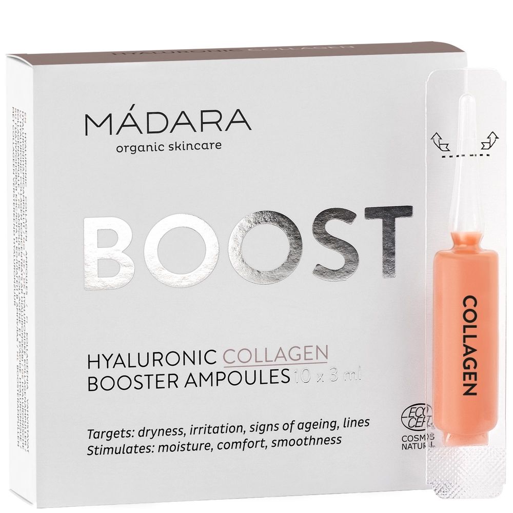 Weiße Verpackung mit Produktnamen MÁDARA BOOST. Enthält Ampullen mit Flüssigkeit. Aufschrift: Hyaluronsäure Collagen Booster Ampullen. COSMOS NATURAL Zertifizierung.