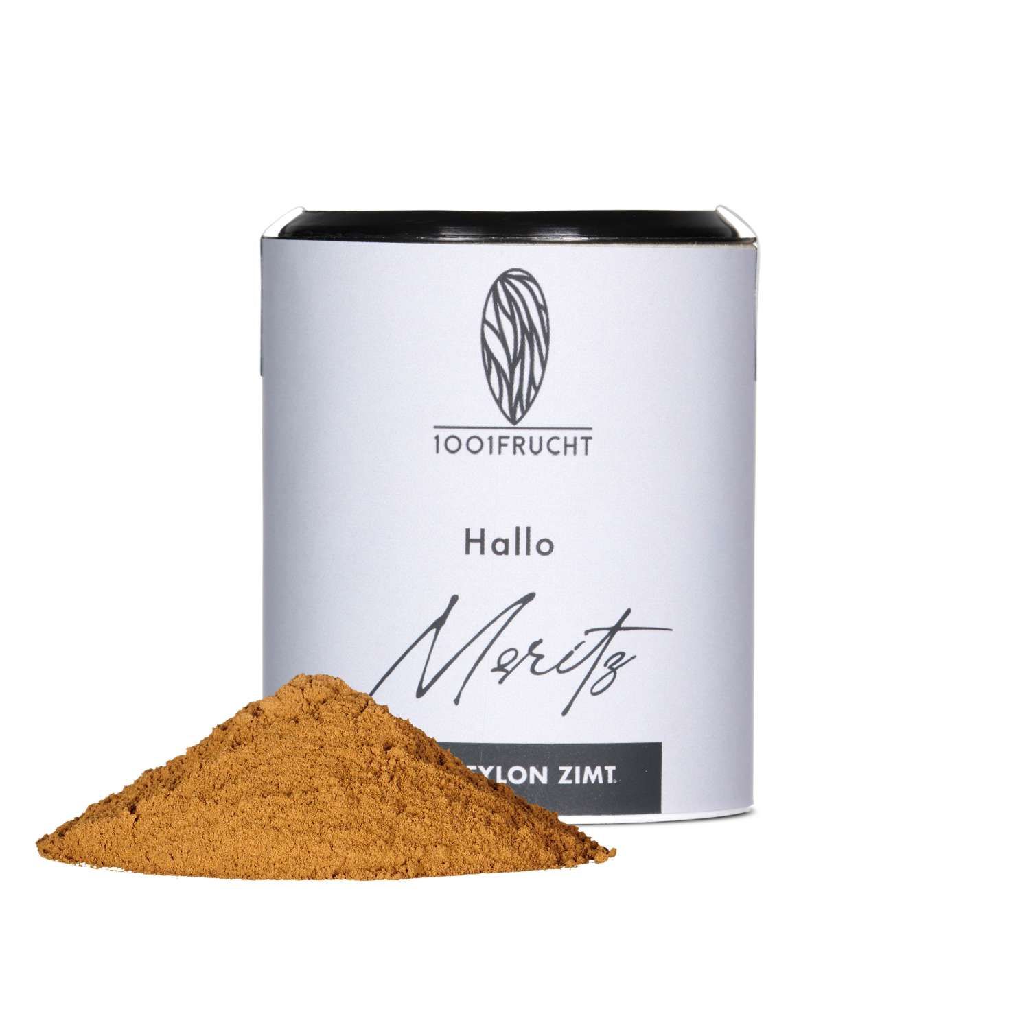 Zylinderförmige Dose mit schwarzem Deckel. Daneben ein Haufen Zimtpulver. Auf der Dose steht "1001Frucht", "Hallo Moritz" und "Ceylon Zimt".