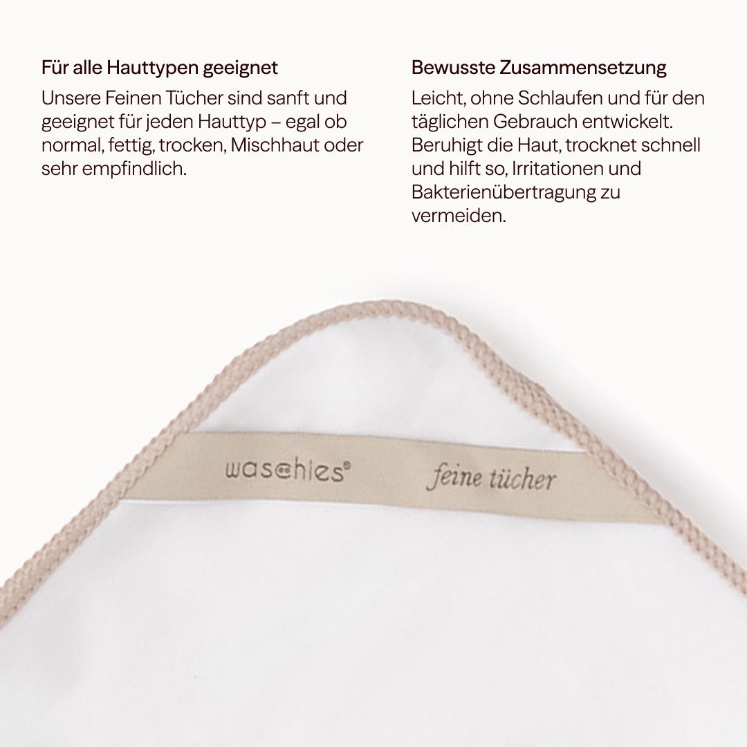 Beige Stoffschlaufe mit „waschies feine tücher“ Schriftzug. Text: Für alle Hauttypen geeignet. Bewusste Zusammensetzung.