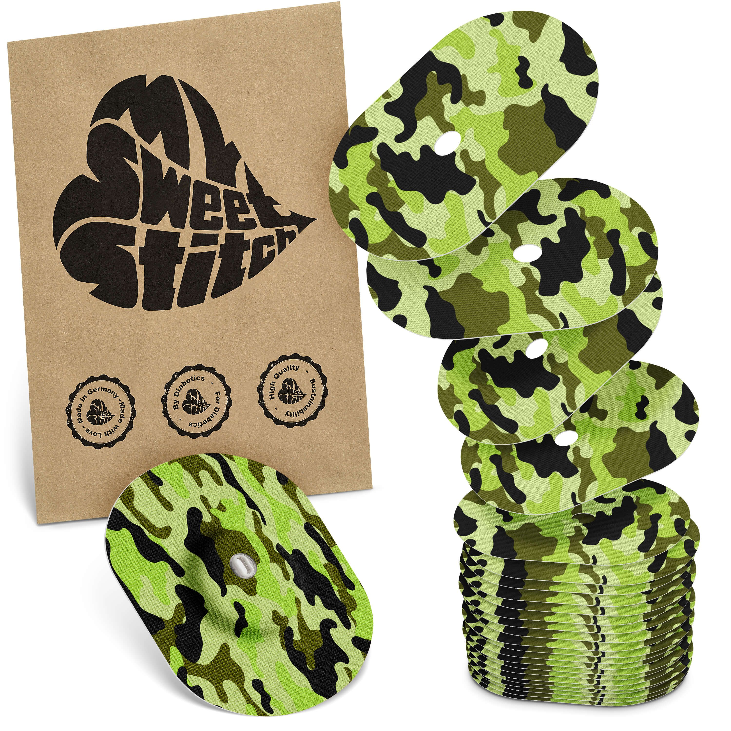 Oval geformte Pflaster mit Camouflage-Muster. Verpackung mit Logo "MySweetStitch". Mehrere Pflaster gestapelt.