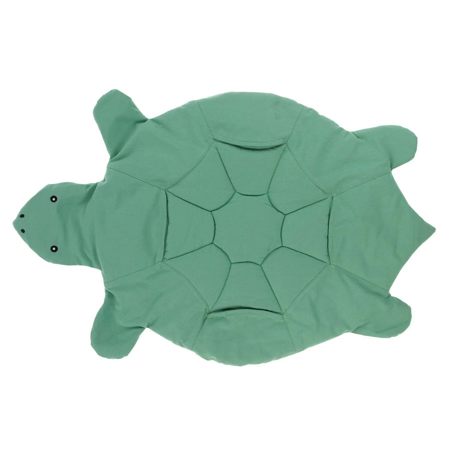 Grüne, schildkrötenförmige Matte mit aufgenähten Augen. Ansicht von oben.