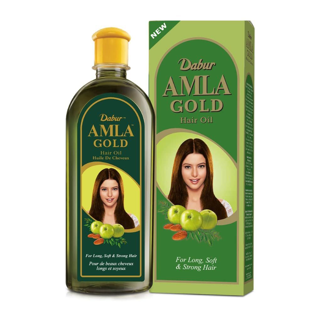 Grüne Flasche und Verpackung mit Produktnamen und Abbildung einer Frau. Text: Hair Oil, For Long, Soft & Strong Hair.