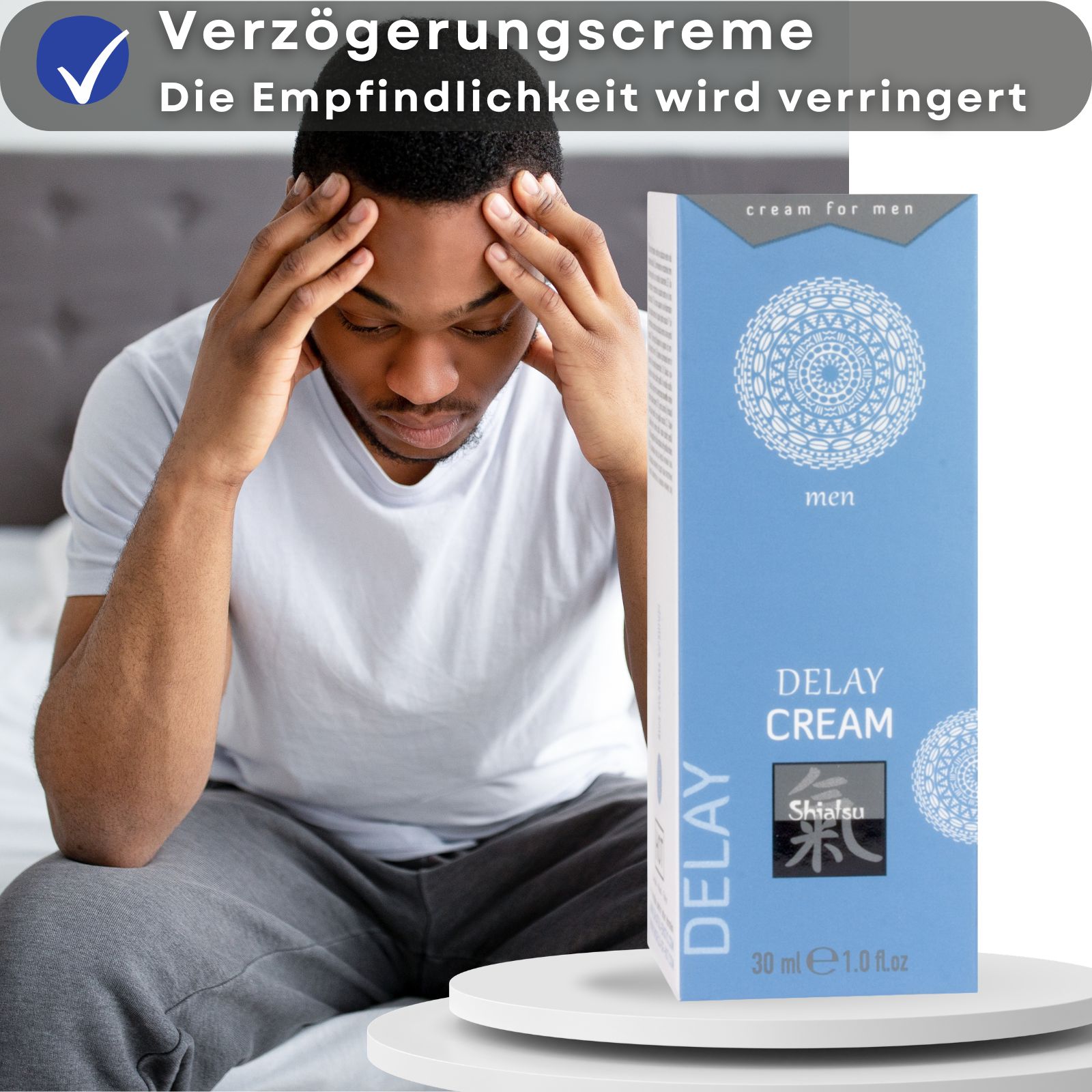 Produkt und Verpackung. Text: DELAY CREAM, Shiatsu, 30 ml. Paar im Hintergrund.
