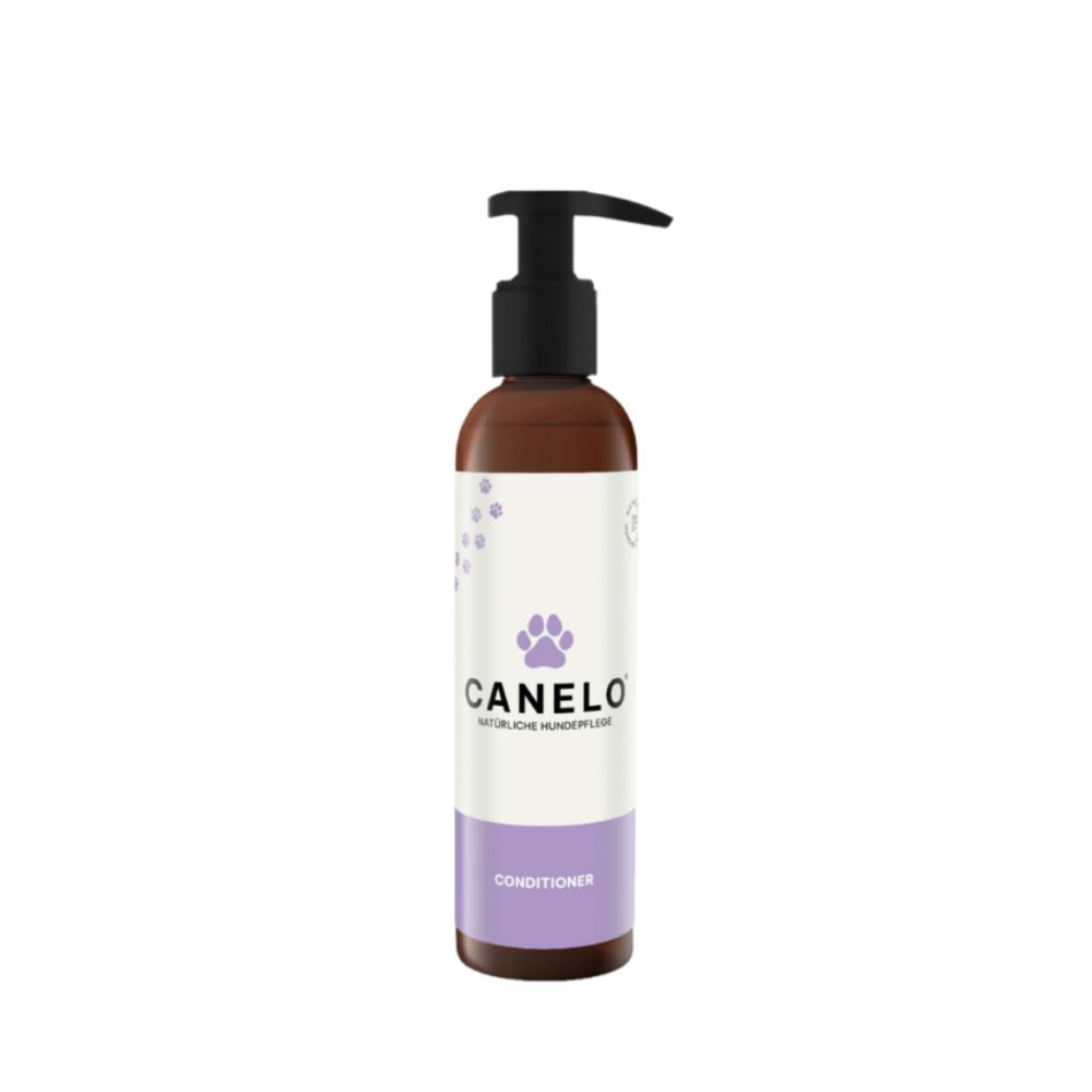 Braune Flasche mit schwarzem Pumpkopf. Aufschrift CANELO, Pfotenabdruck, Conditioner.