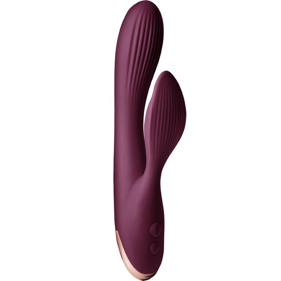 Lila Vibrator mit zwei Enden und geriffelter Oberfläche. Goldfarbener Sockel. Zwei Knöpfe.
