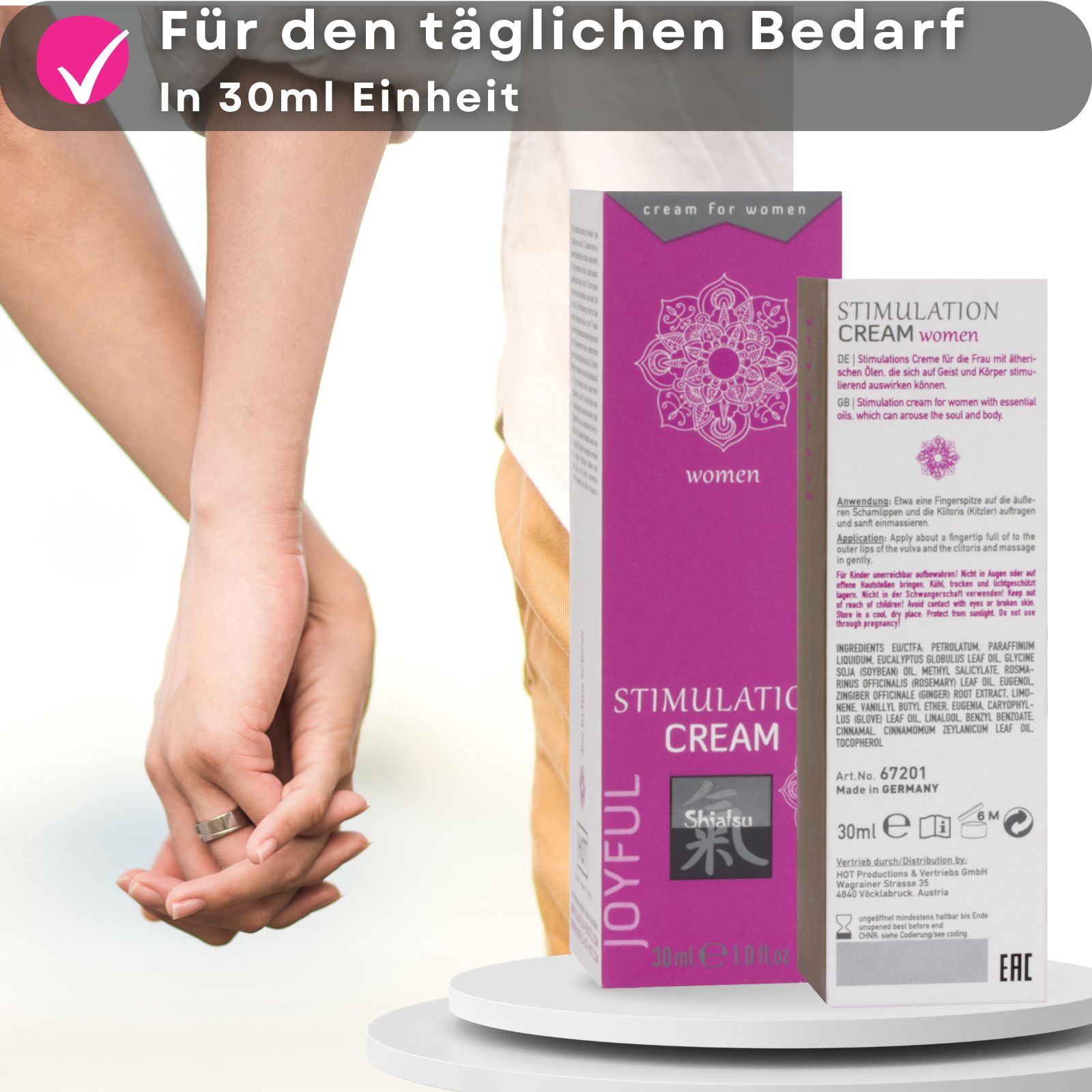 Schachtel und Tube. Aufschrift: Stimulation Cream, Shiatsu, Joyful. Für Frauen. Paar im Hintergrund.
