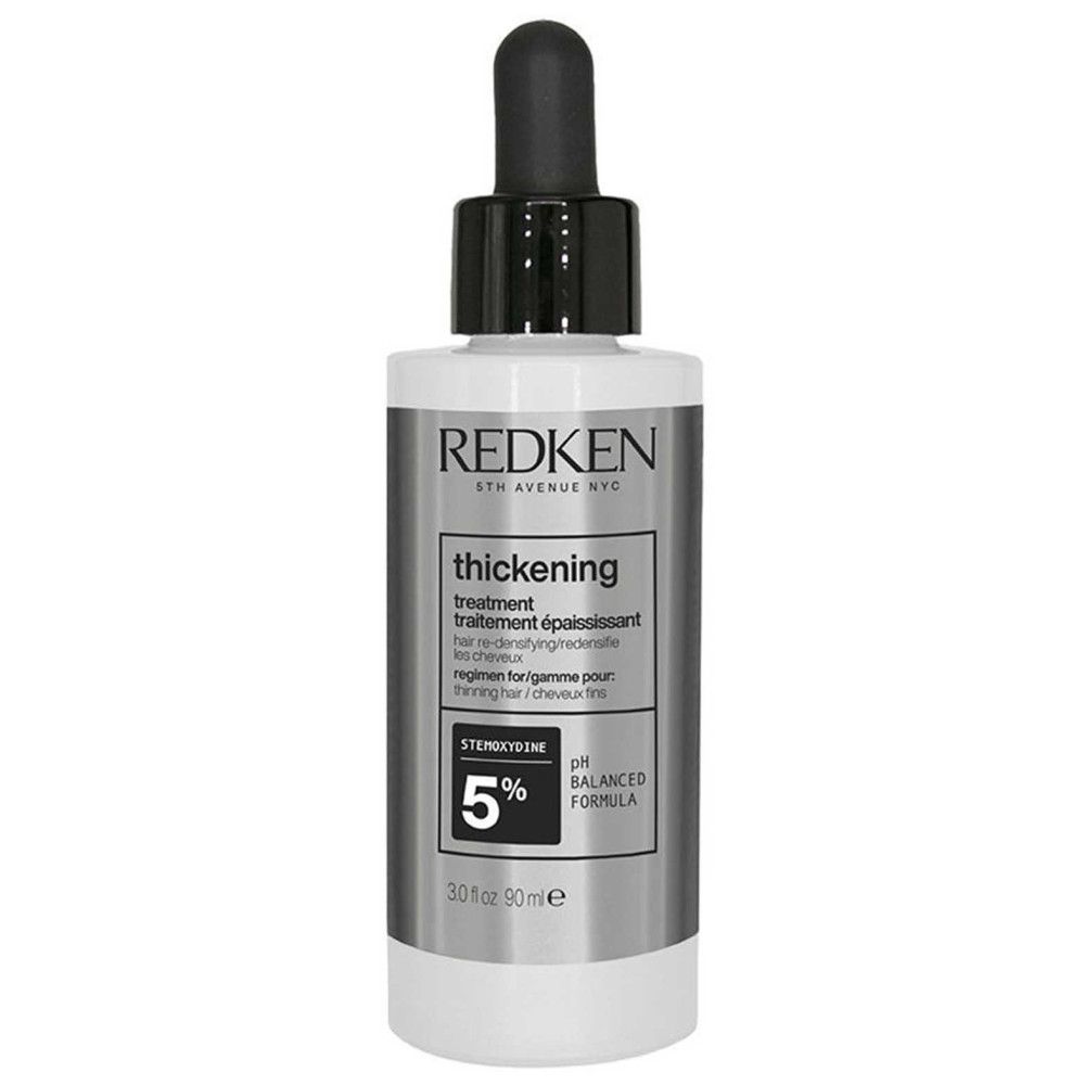 Redken-Produkt mit schwarzem Tropfer. Aufschrift: thickening treatment. Enthält 5% Stemoxydine. Weiße Flasche.