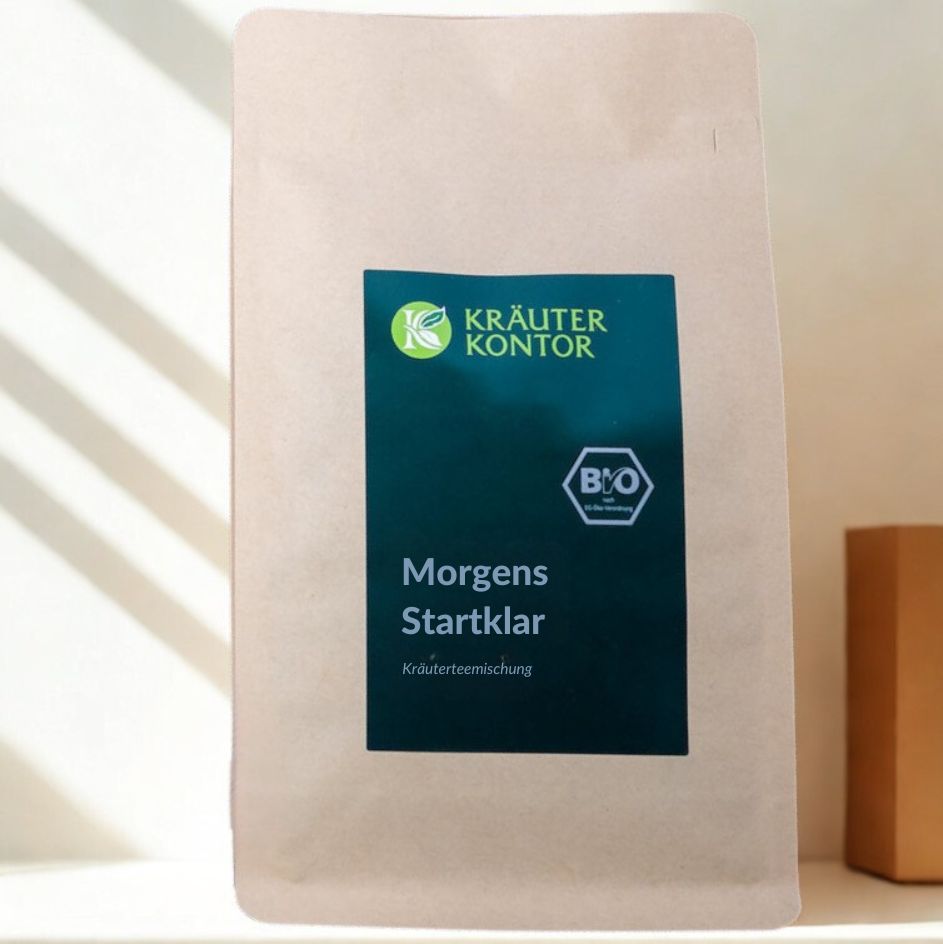Beutel mit Kräuterkontor-Logo und Aufschrift Morgens Startklar. Bio-Siegel.