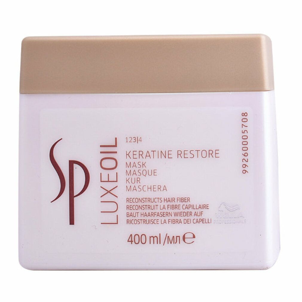 Weißer Tiegel mit goldfarbenem Deckel. Aufschrift: SP Luxeoil Keratin Restore Mask. 400 ml.