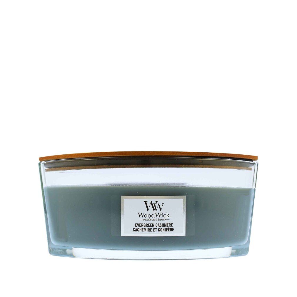 Kerze mit Glasbehälter und Holzdeckel. Auf dem Etikett steht WoodWick Evergreen Cashmere.