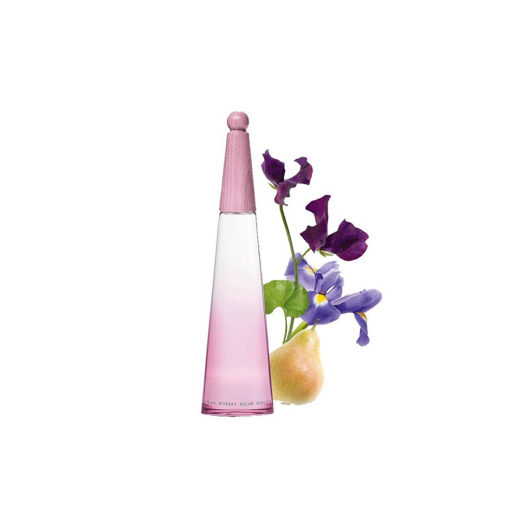 Eau de Toilette Intense Flakon. Rosa Farbverlauf, Holzdeckel. Violette Blüten und Birne. Klarer Glasbehälter.