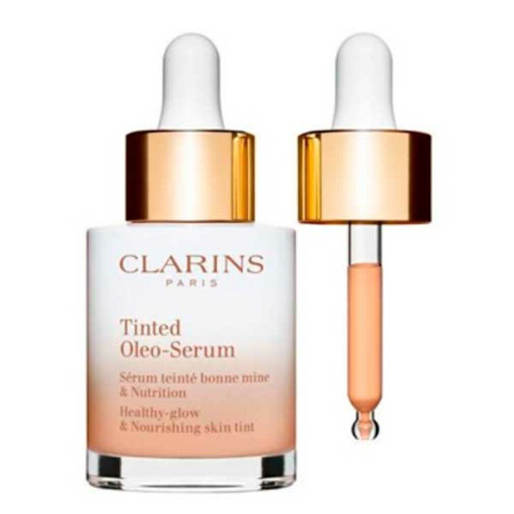 Clarins Tinted Oleo-Serum Flasche mit geöffneter Pipette. Weißes Glas, goldener Deckel. Pipette mit getönter Flüssigkeit. Text: Clarins Paris, Tinted Oleo-Serum.