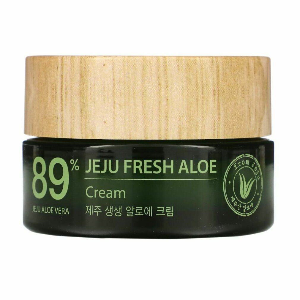 Cremeglas mit Holzdeckel. Aufschrift: 89% Jeju Fresh Aloe Cream. Grünes Glas mit weißer Schrift.