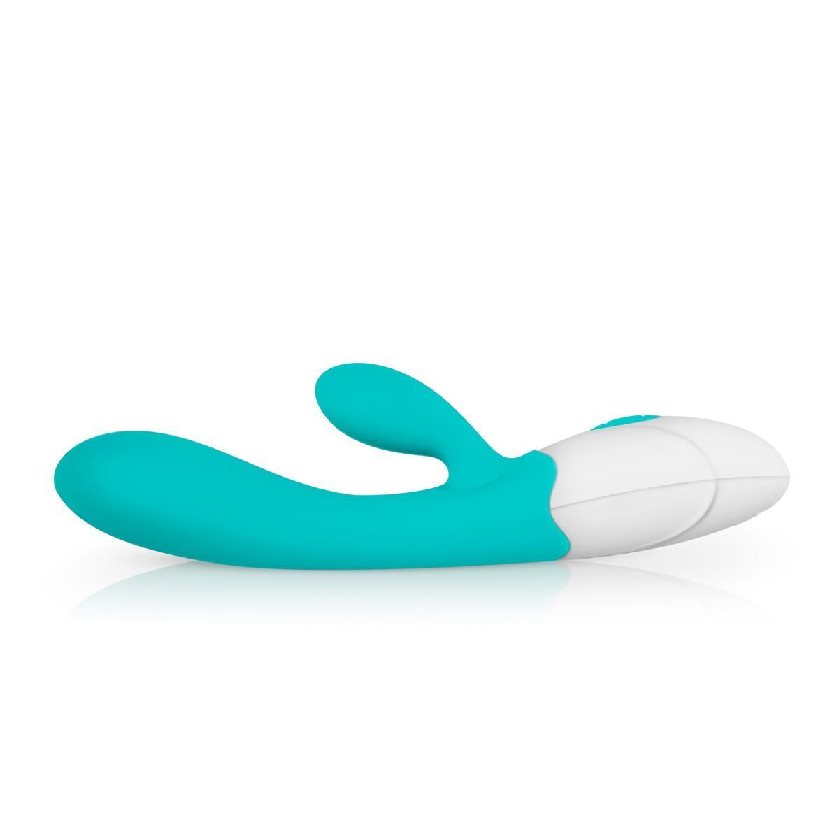Vibrateur turquoise et blanc. Forme ergonomique avec deux éléments de stimulation. Base blanche avec boutons de commande.
