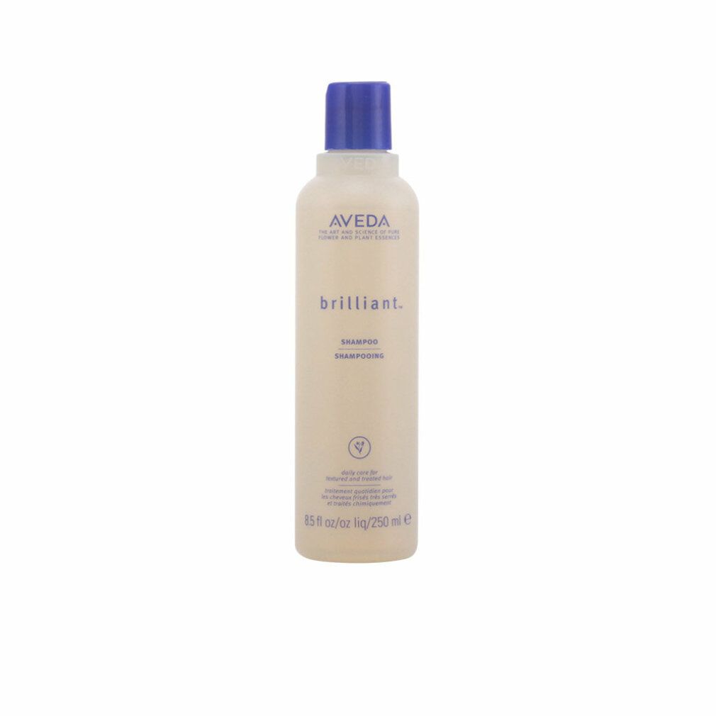 Beige Shampoo-Flasche mit blauem Deckel. Aufschrift: Aveda, brilliant. Shampoo. 250 ml. Vegan-Logo.