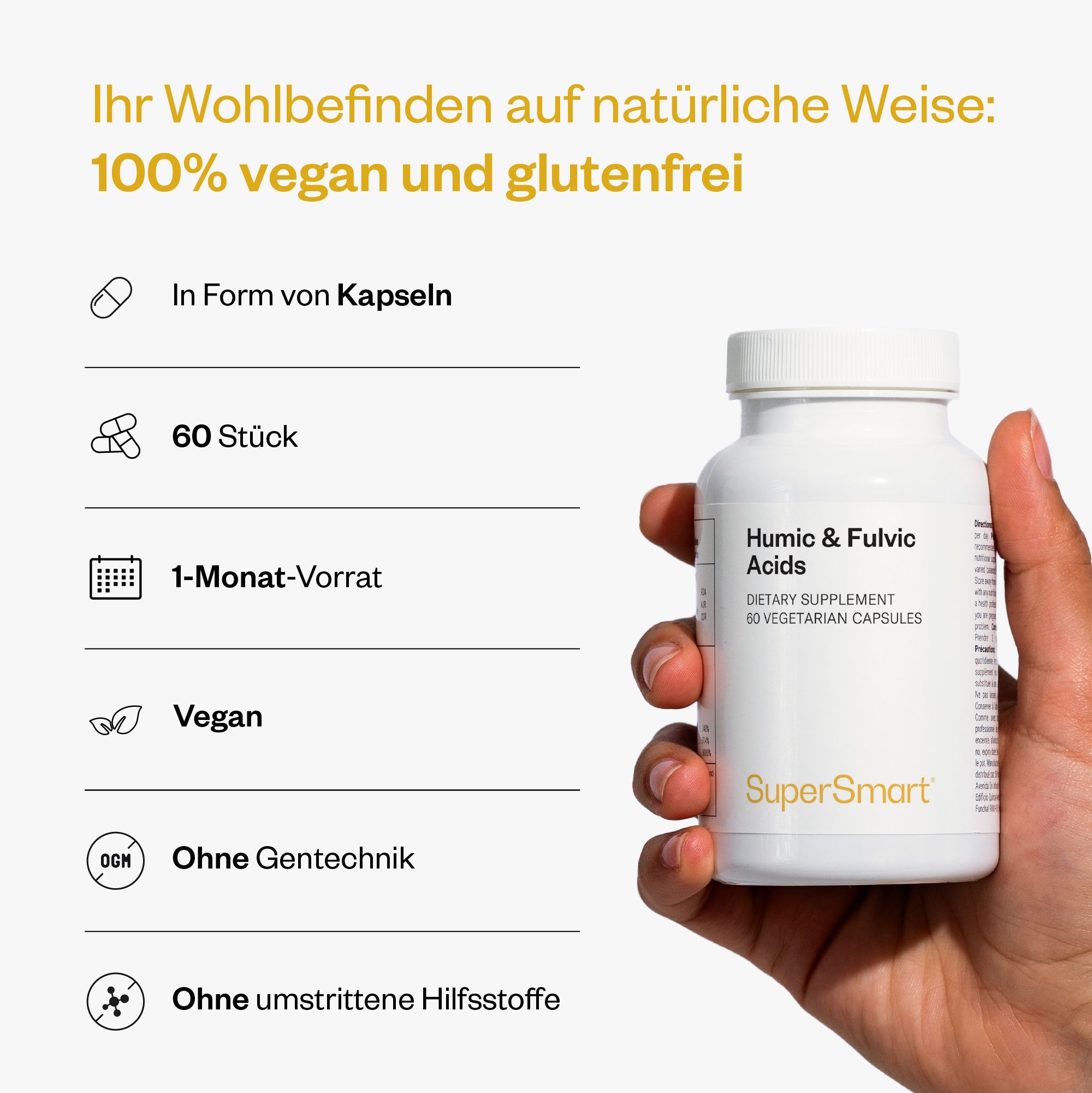 Hand hält eine weiße Flasche Huminsäuren & Fulvinsäuren. 60 Kapseln, 1-Monats-Vorrat, vegan, ohne Gentechnik, ohne Hilfsstoffe.