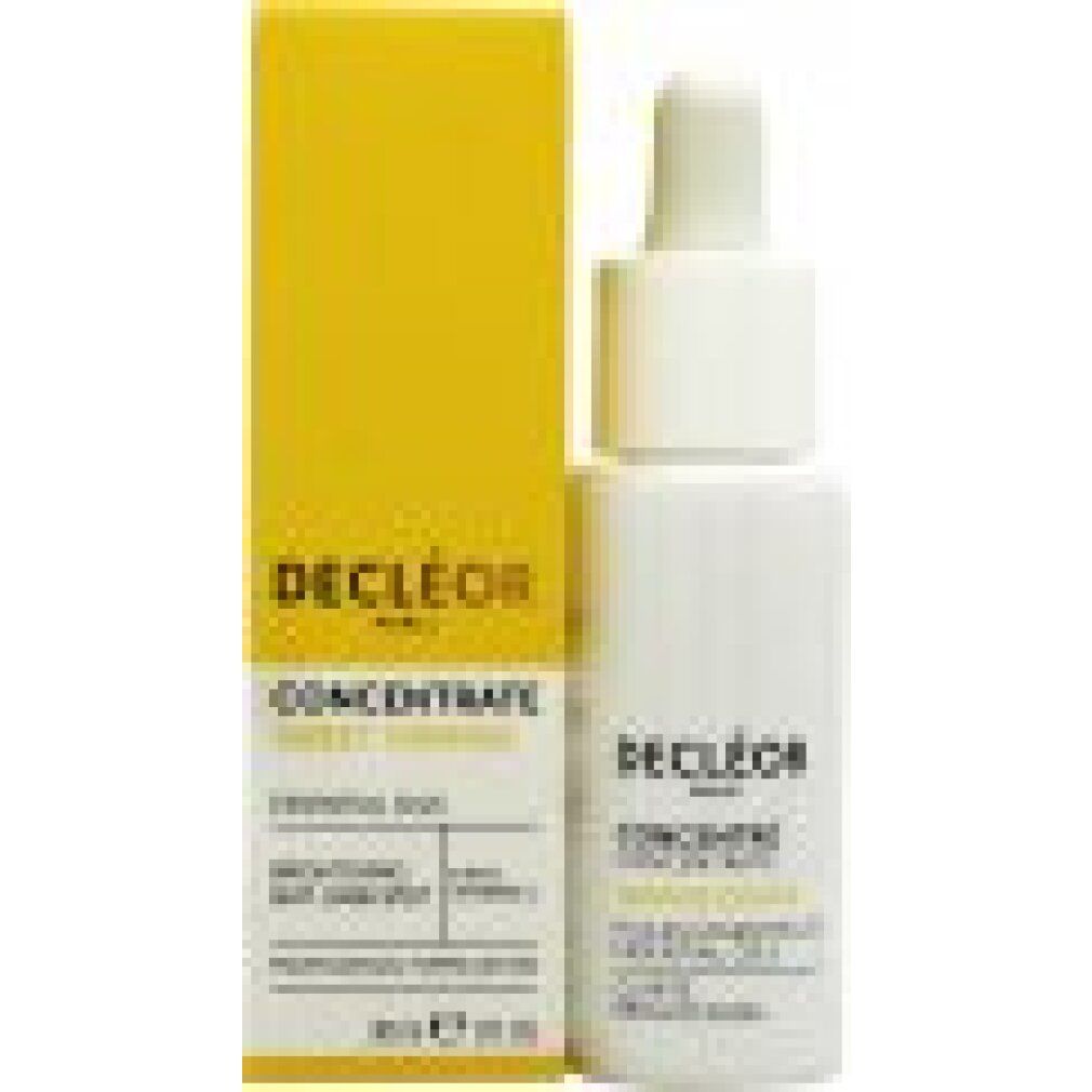 Weiße Flasche und gelbe Schachtel. Aufschrift: Decleor, Concentré Sweet Orange, Essential Oils, 30ml, 1 fl oz.