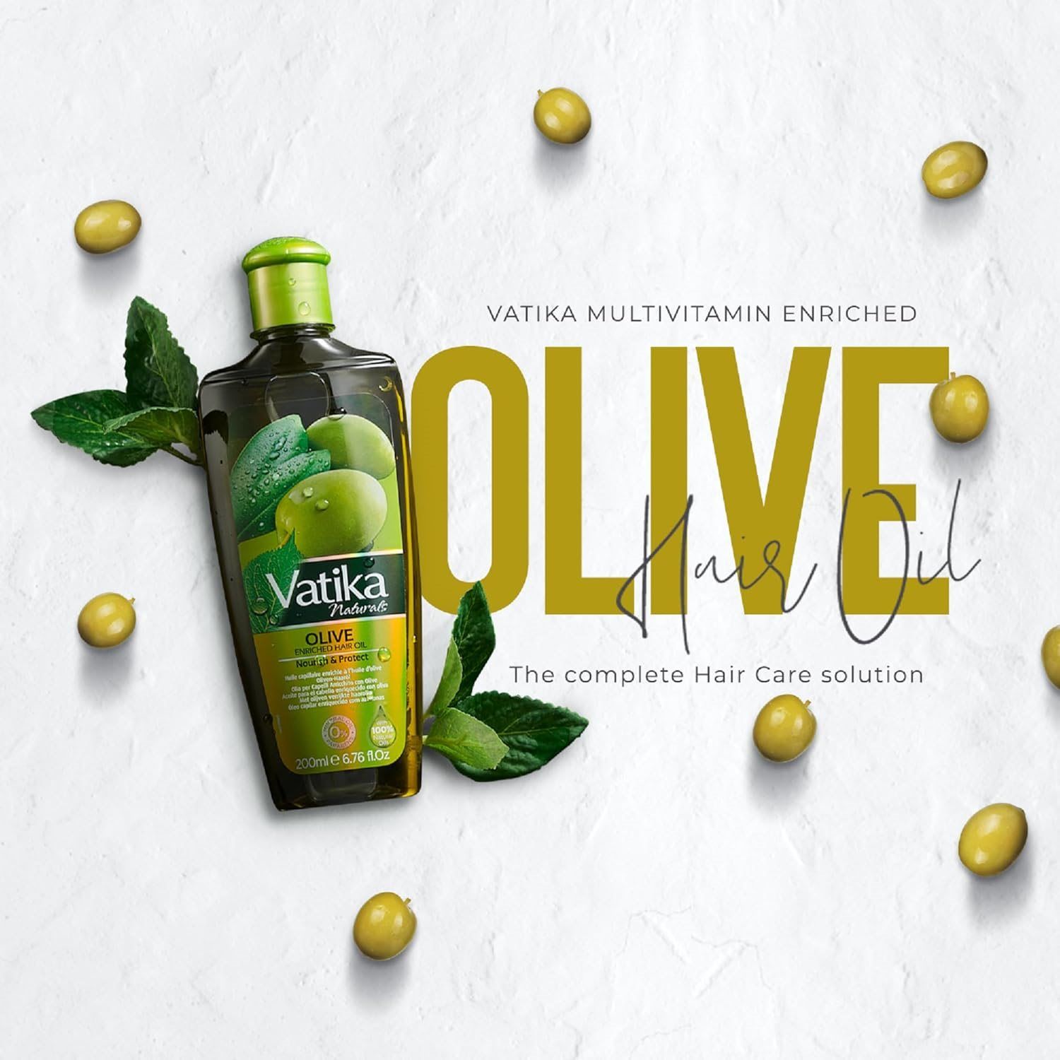 Werbebild mit Haarölflasche, Oliven und Blättern. Aufschrift: Vatika, Olive Hair Oil, The complete Hair Care solution.