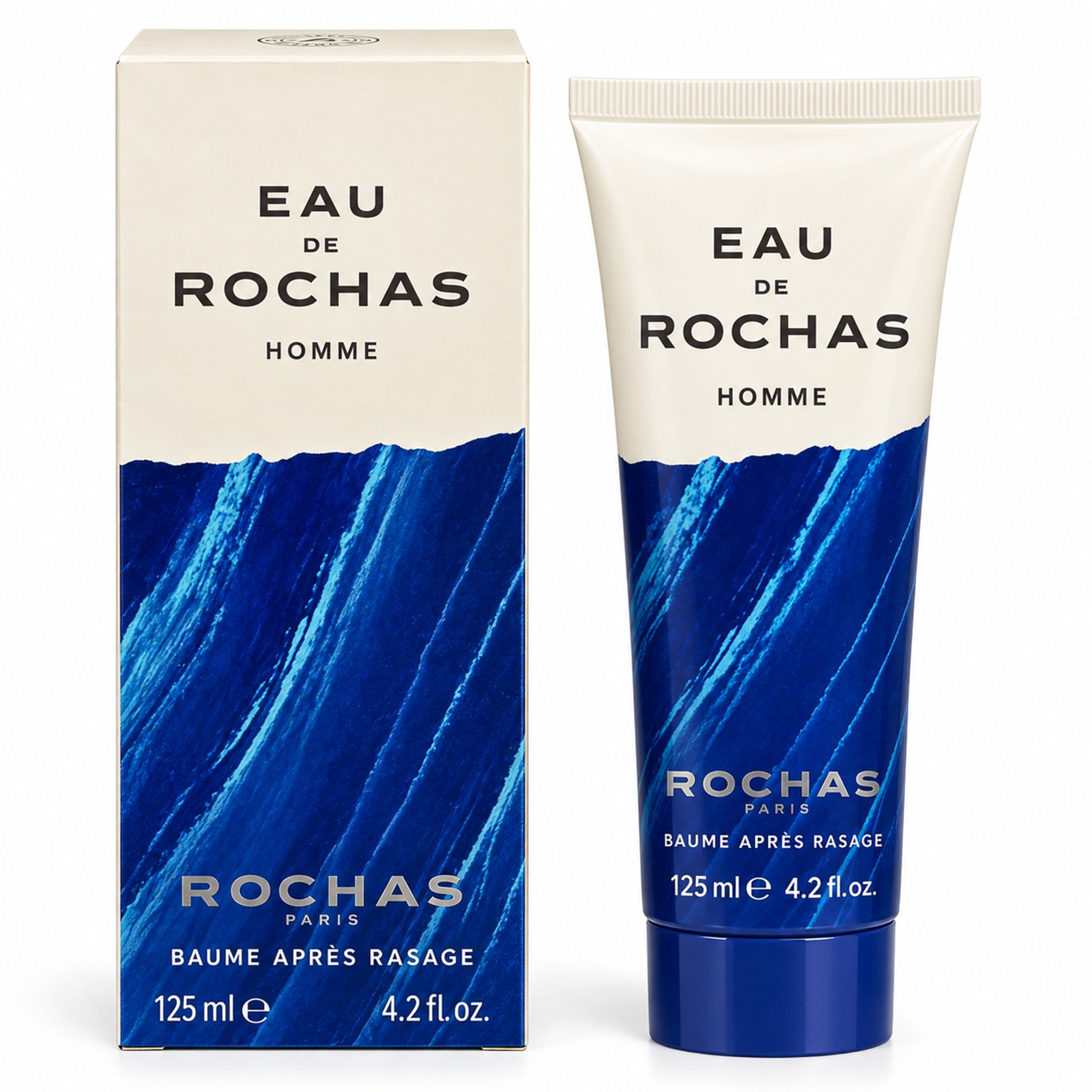 Rochas Eau de Rochas Homme After Shave Balm Set. Enthält eine Tube und eine Verpackungsbox mit blauen Wellenmustern.