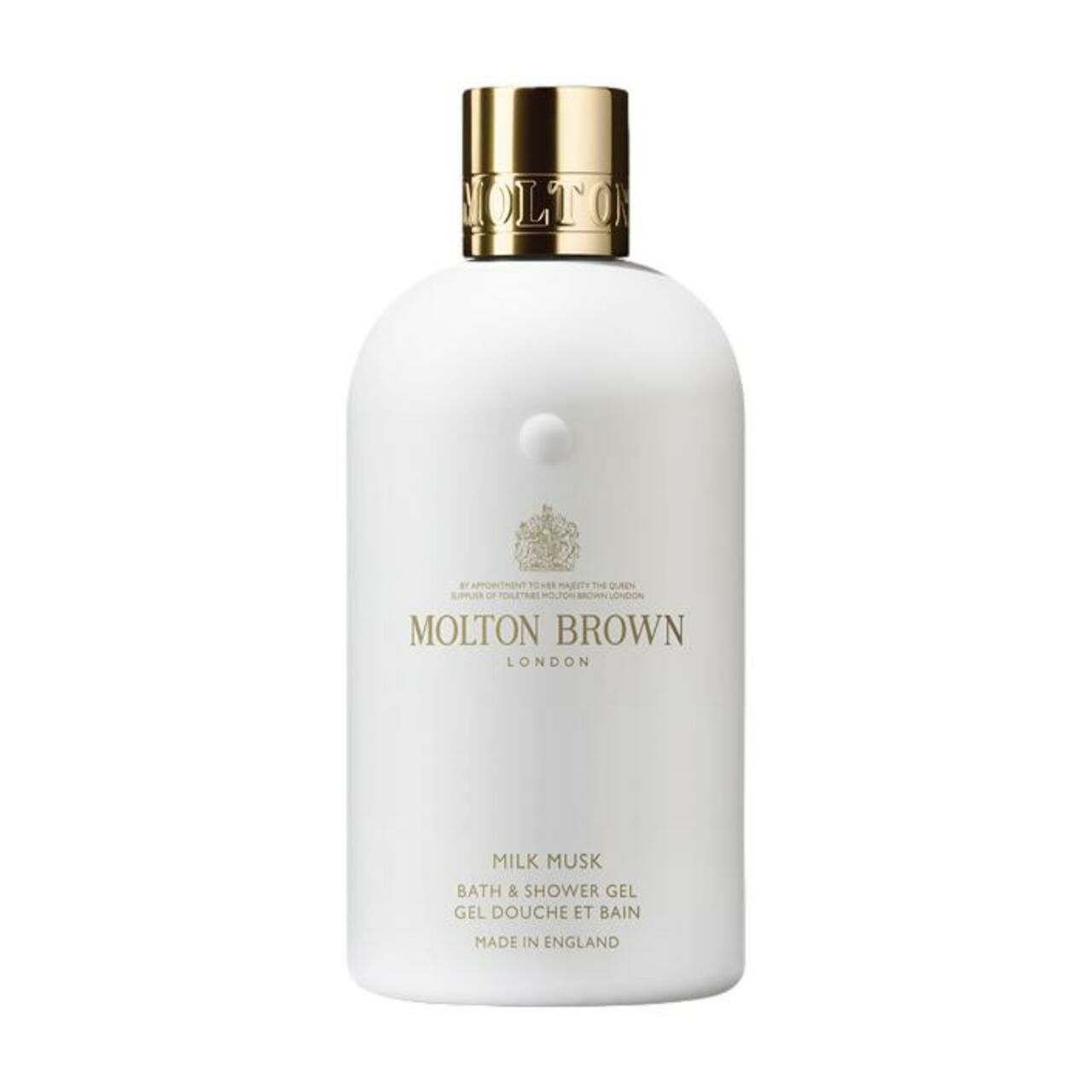 Weiße Molton Brown Flasche mit goldenem Verschluss, Milk Musk Bade- und Duschgel.