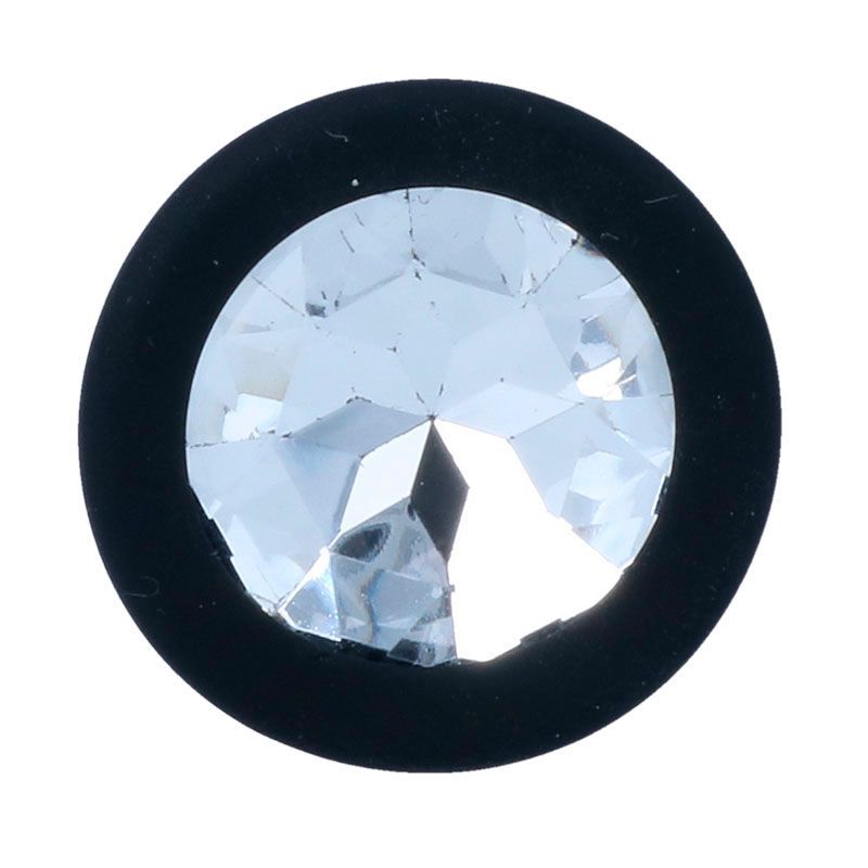 Nahaufnahme eines schwarzen Plugs mit Kristall-Akzent.