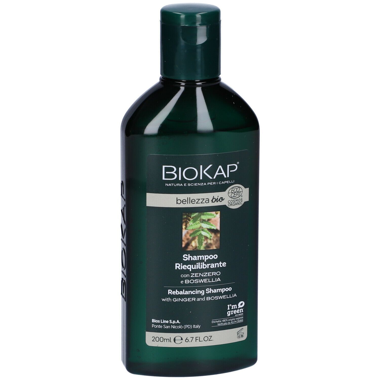 Dunkelgrüne Flasche Biokap Bellezza Bio Rebalancing Shampoo mit Bild von Blättern und Text.