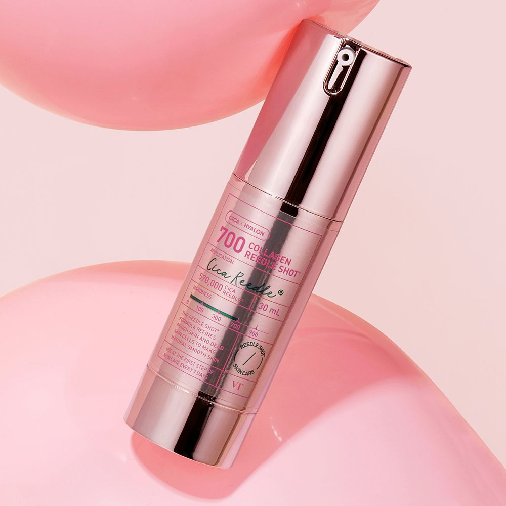 Rosafarbene Flasche mit Pumpspender, 30 ml. Beschriftung: '700 COLLAGEN RE-SHOT'.