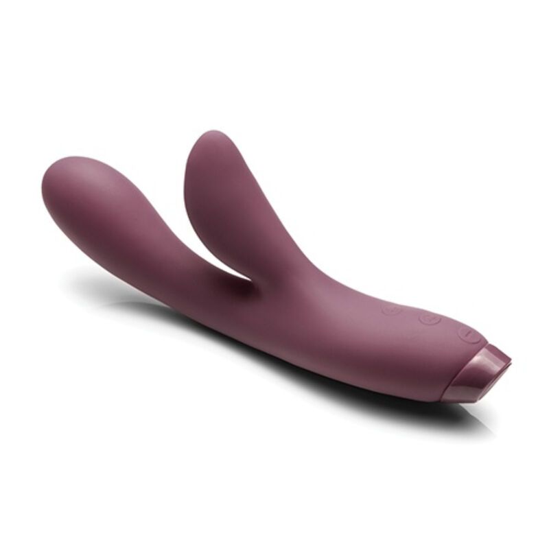 Lila Vibrator in Hasenform. Zwei Ohren, gebogene Form. Auf weißem Hintergrund.