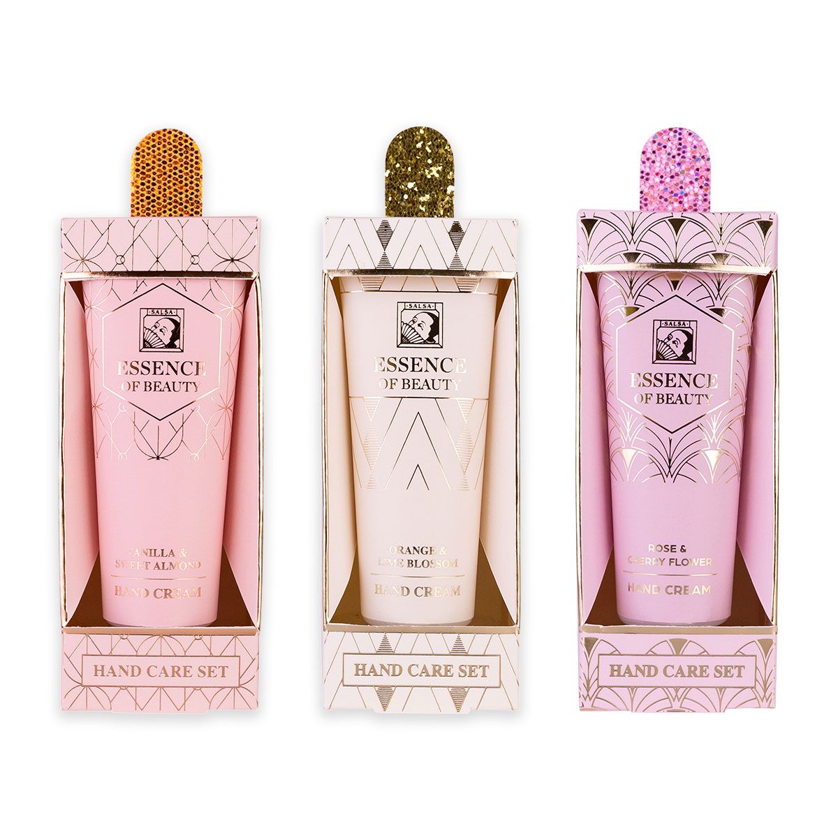 Drei einzelne Handcreme-Sets in rosa Verpackung mit goldener Schrift und Verzierungen.