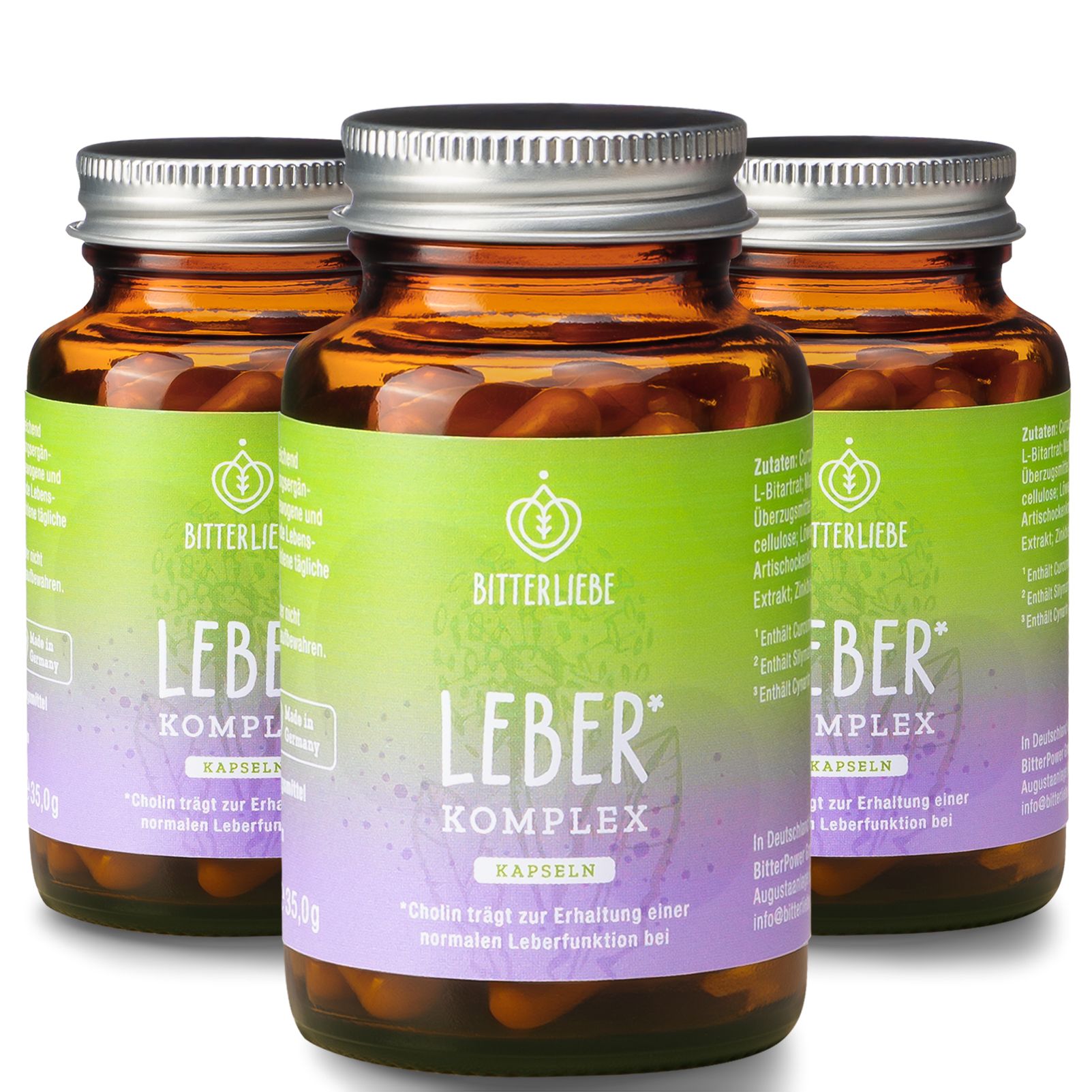Drei braune Glasflaschen mit BitterLiebe Leber Komplex Kapseln. Etiketten mit Produktinformationen. Silberne Deckel.