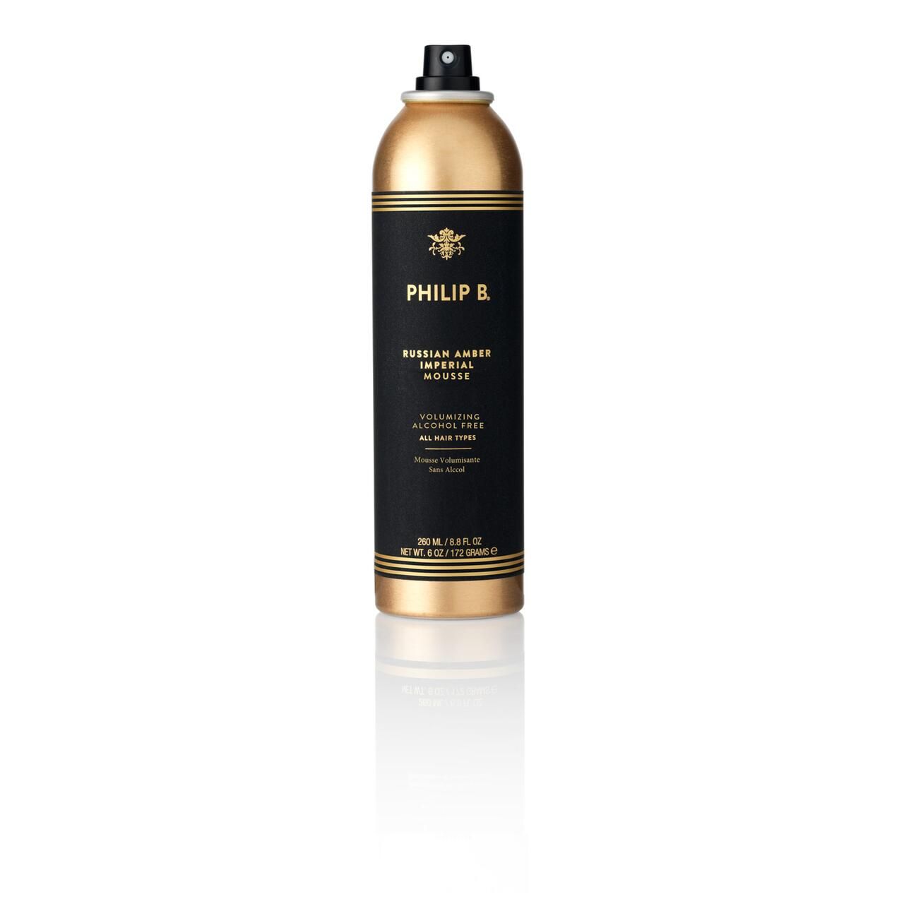 Goldfarbene Sprühflasche mit schwarzem Etikett. Aufschrift: Philip B, Russian Amber Imperial Mousse. Volumen-Mousse, alkoholfrei.