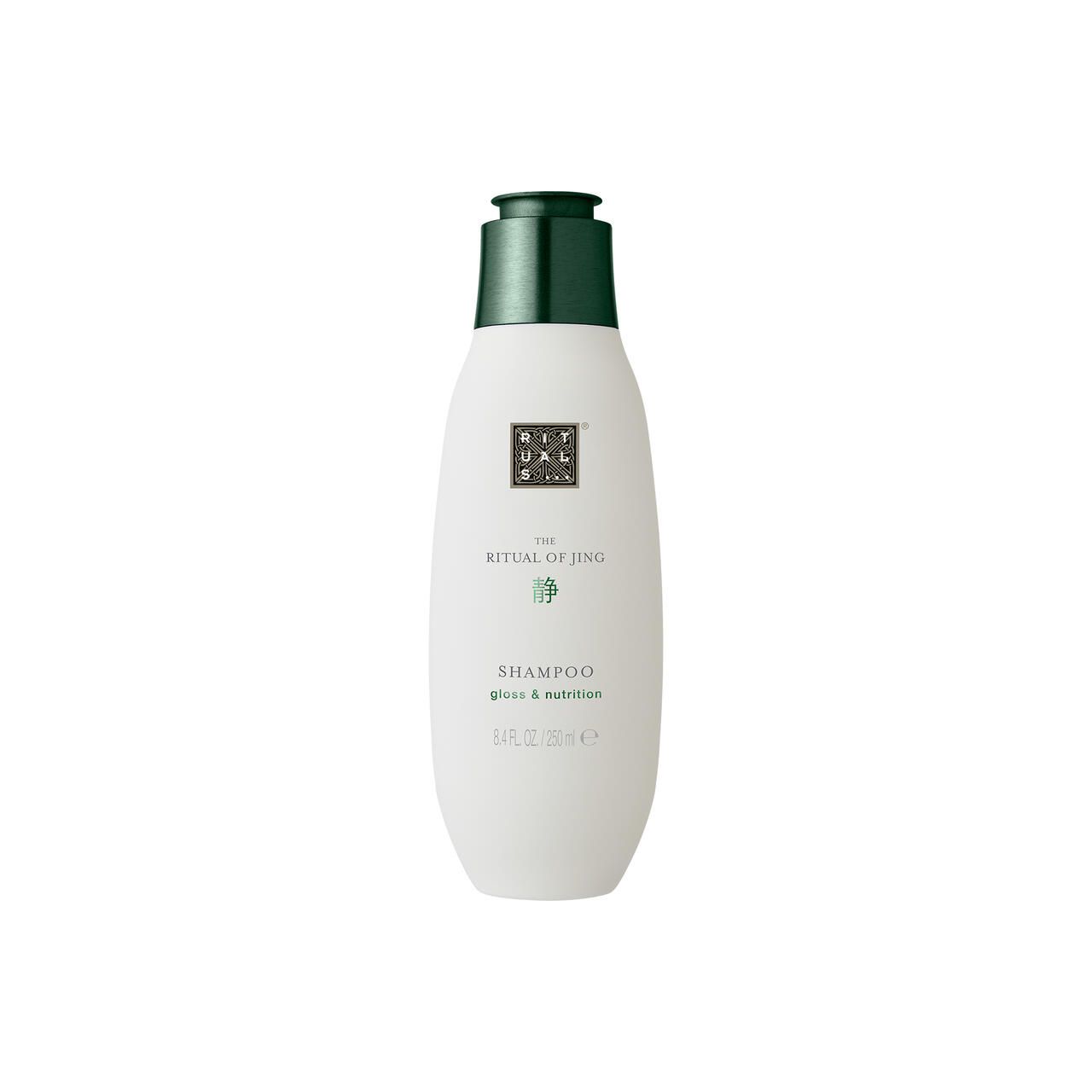 Weißliche Flasche mit grünem Deckel. Aufschrift: The Ritual of Jing, Shampoo. Text in Schwarz und Grün.