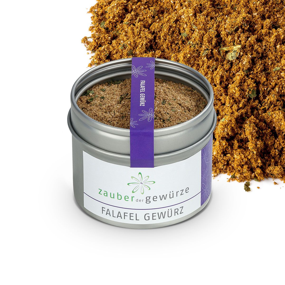 Gewürzdose mit Falafel Gewürz. Silberne Dose mit lila Band. Gewürz daneben. Aufschrift: Zauber der Gewürze, Falafel Gewürz.