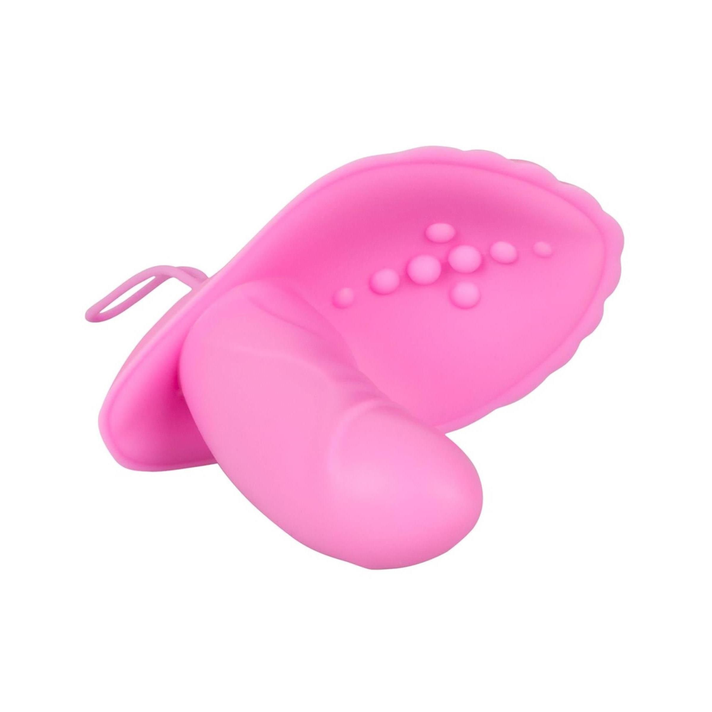 Rosa Vibrator. Zwei Teile, muschelförmig. Oberfläche mit kleinen Erhebungen. Mit Schlaufe. Keine weiteren Details.