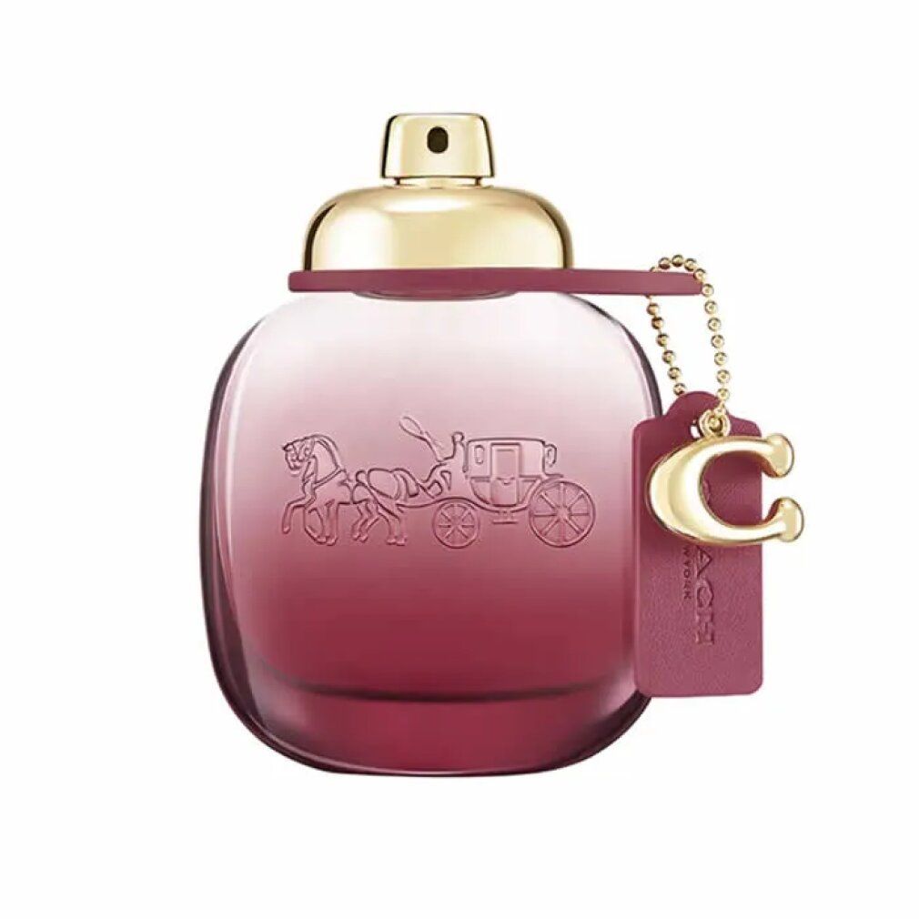Coach Wild Rose Eau de Parfum Flakon mit goldener Kappe und Anhänger.