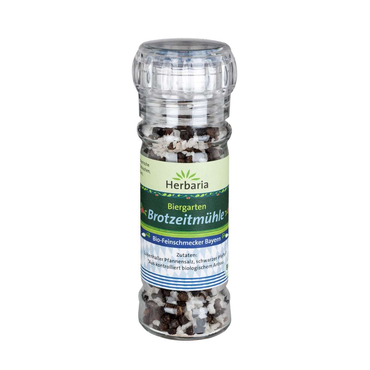 Transparente Gewürzmühle mit Salz und Pfeffer. Etikett mit "Herbaria Biergarten Brotzeitmühle Bio".