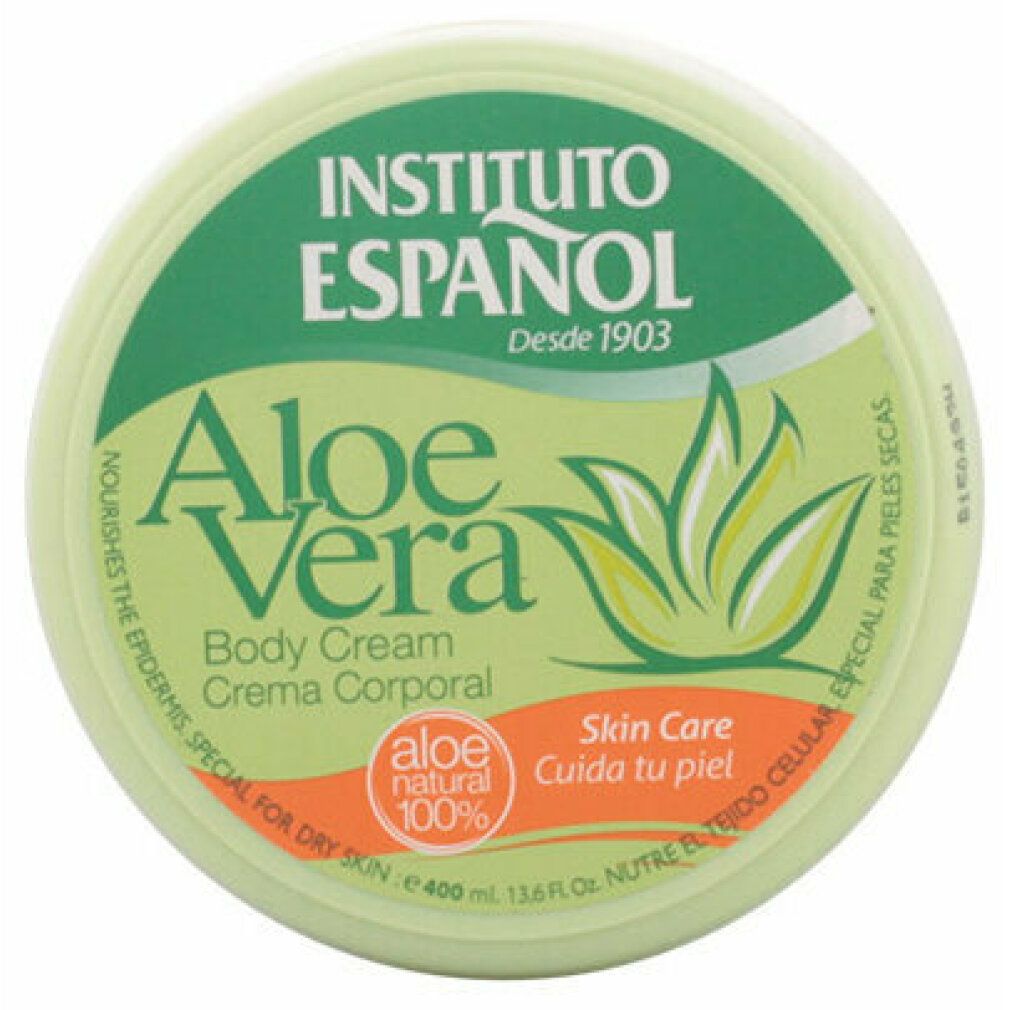 Runder Behälter mit grünem Deckel. Aufschrift: Aloe Vera, Instituto Espanol, Aloe natural 100%. Für trockene Haut.