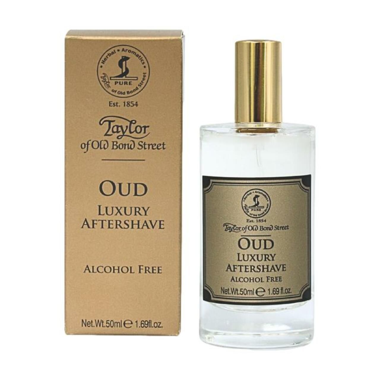 Produkt mit Verpackung. Flakon mit goldfarbenem Verschluss und Karton. Text: Oud Luxury Aftershave, Alcohol Free. Marke: Taylor of Old Bond Street.