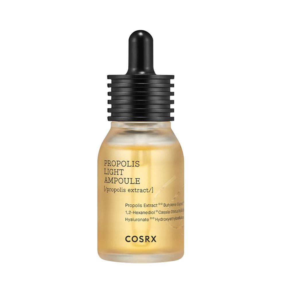 COSRX Propolis Light Ampulle in Glasflasche mit Pipettenverschluss, gelbe Flüssigkeit, klare Kennzeichnung.