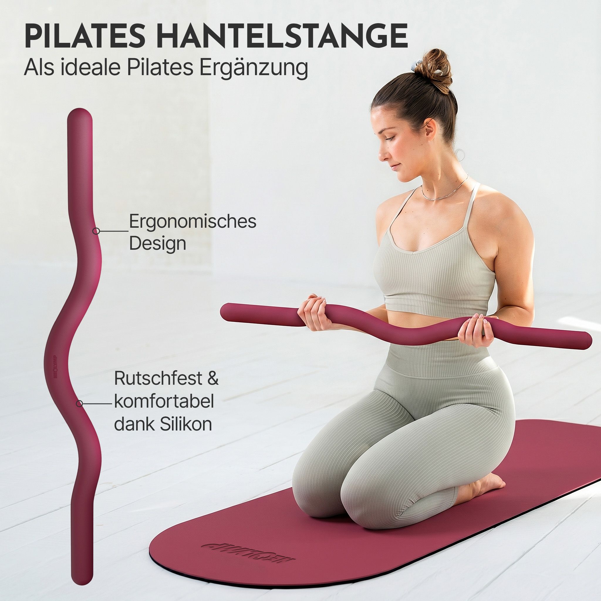 Frau mit Pilates SZ Stange. Ergonomisches, rutschfestes Design dank Silikon.