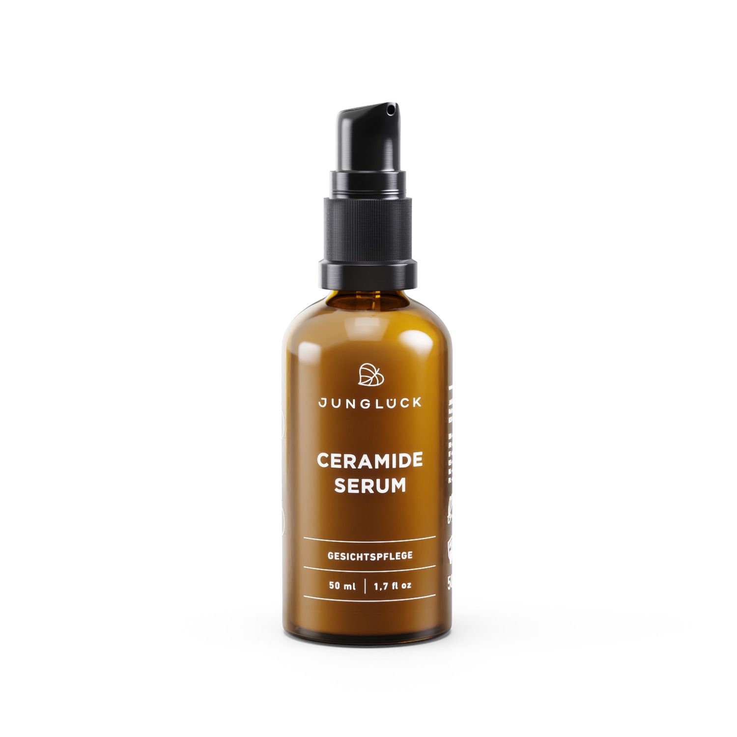 Braune Glasflasche mit schwarzem Pumpkopf. Beschriftung: JUNGLÜCK Ceramide Serum, Gesichtspflege. Volumen: 50 ml / 1.7 fl. oz.