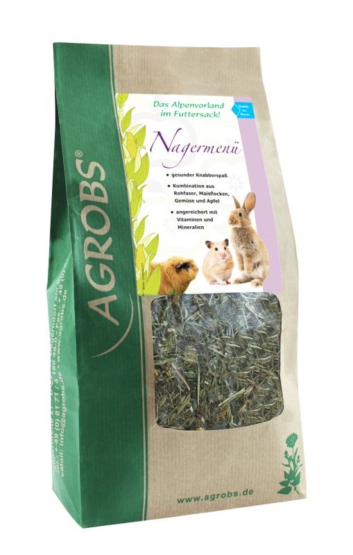 Beutel mit Nagermenü. Sichtfenster zeigt getrocknete Kräuter. Logo und Produktname auf der Verpackung. Abbildung von Tieren.