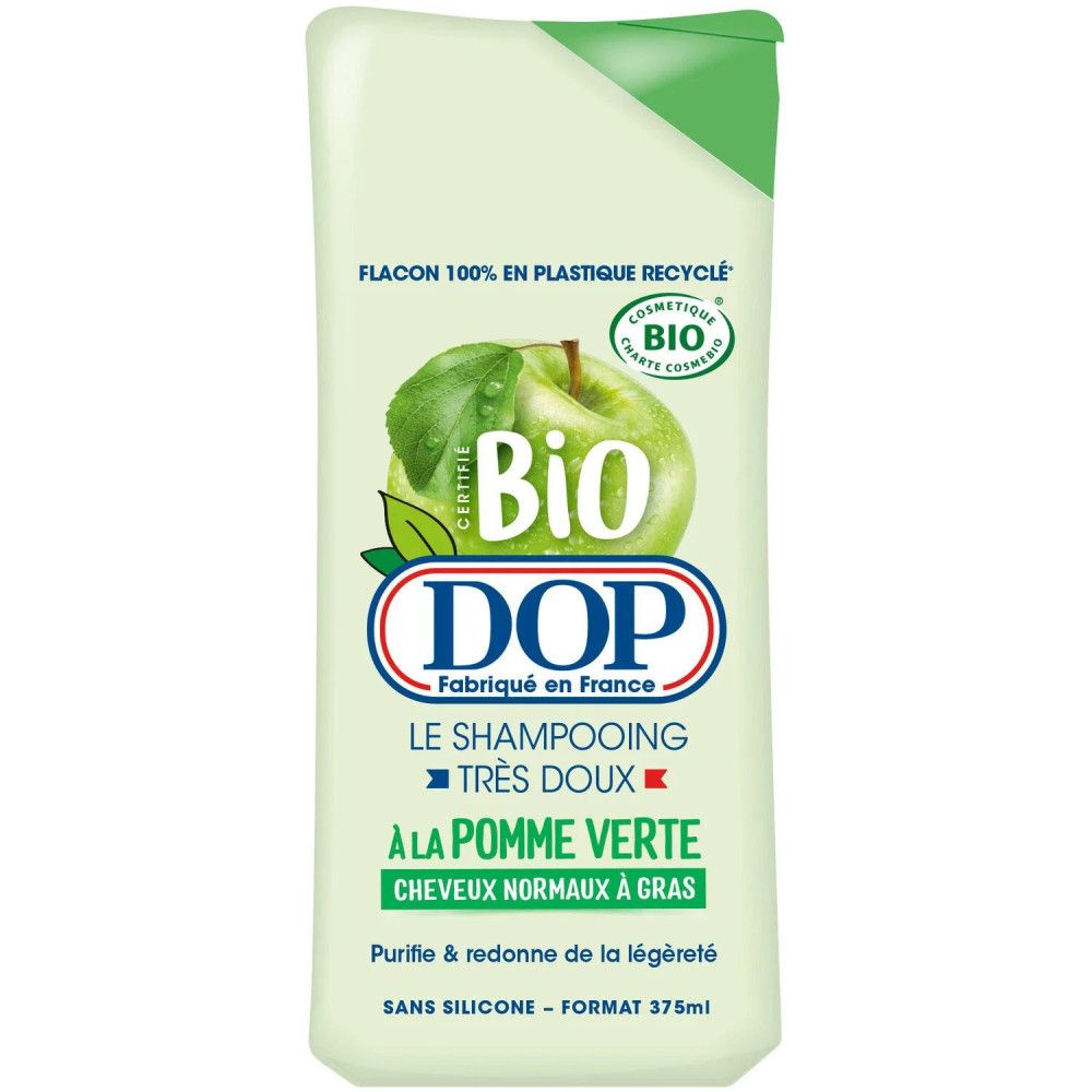 Grüne Shampoo-Flasche mit Apfel-Illustration und DOP-Logo. Text: Bio, Très Doux, À la Pomme Verte, für normales bis fettiges Haar.